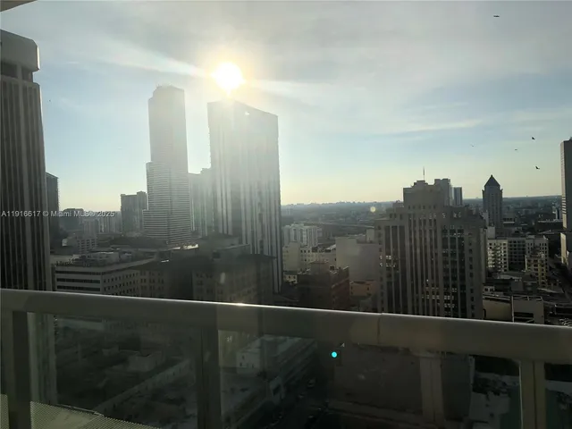 a front view of house with a garden