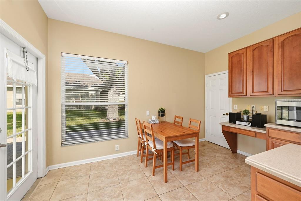 936 Kingsridge Circle Gotha, FL 34734 - Photo 19 of 50 a dining room with a sink a counter top space and a window