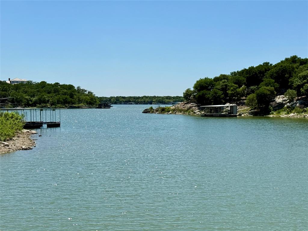 2007 Deep Water Road May, TX 76857 - Photo 40 of 40 a view of a lake with houses in background