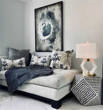 a bedroom with bed and window