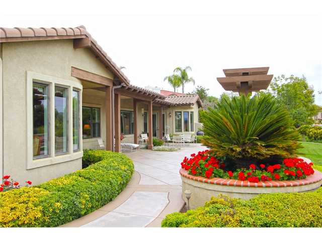 4010 Limber Pine Road Fallbrook, CA 92028 - Photo 21 of 24 Red geraniums give the yard a pop of color!