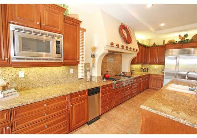 4010 Limber Pine Road Fallbrook, CA 92028 - Photo 8 of 24 Kitchen boasts professional grade appliances, including Wolf stove top, Sub Zero refrigerator and double Jen Air ovens.