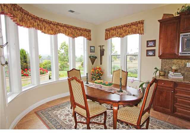 4010 Limber Pine Road Fallbrook, CA 92028 - Photo 9 of 24 Delightful eat in kitchen area with lots of windows to enjoy the stunning views.