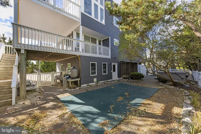 a view of a deck with a yard