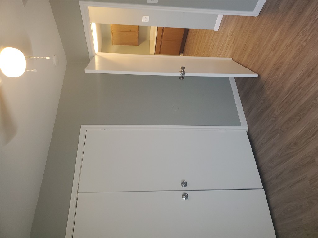 2221 Creekside Lane, Unit B Georgetown, TX 78626 - Photo 17 of 33 Unfurnished bedroom with light wood-type flooring, a closet, and ceiling fan