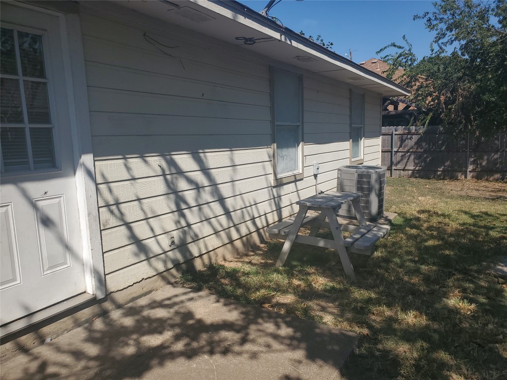 2221 Creekside Lane, Unit B Georgetown, TX 78626 - Photo 25 of 33 View of home's exterior featuring a central AC unit
