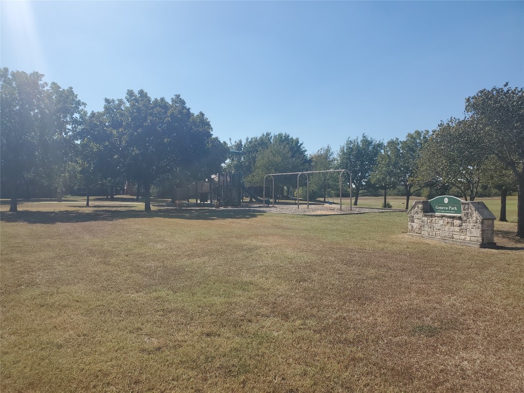 2221 Creekside Lane, Unit B Georgetown, TX 78626 - Photo 29 of 33 View of home's community with a yard and view of scattered trees