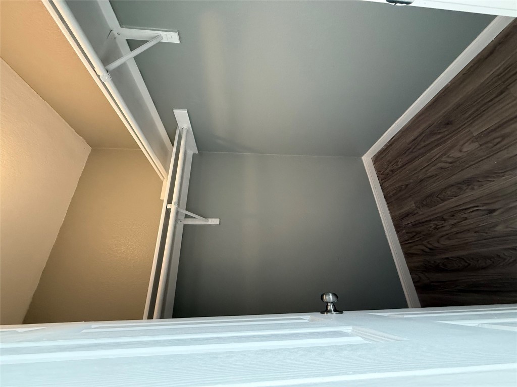 2221 Creekside Lane, Unit B Georgetown, TX 78626 - Photo 31 of 33 Spacious closet featuring dark wood-style flooring