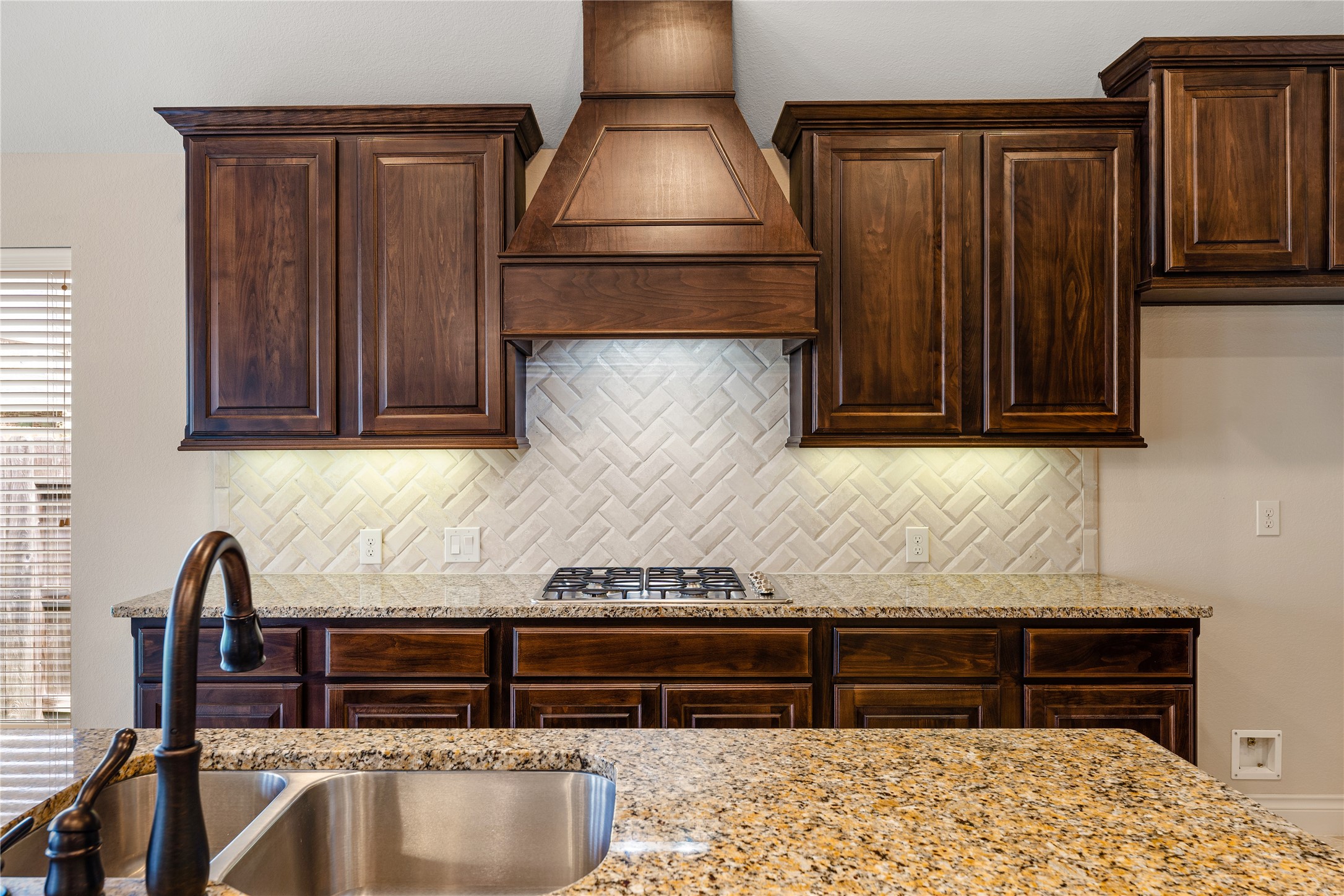 2938 Bobby Jones Road Katy, TX 77494 - Photo 11 of 28 closeup of a sink and a wooden table