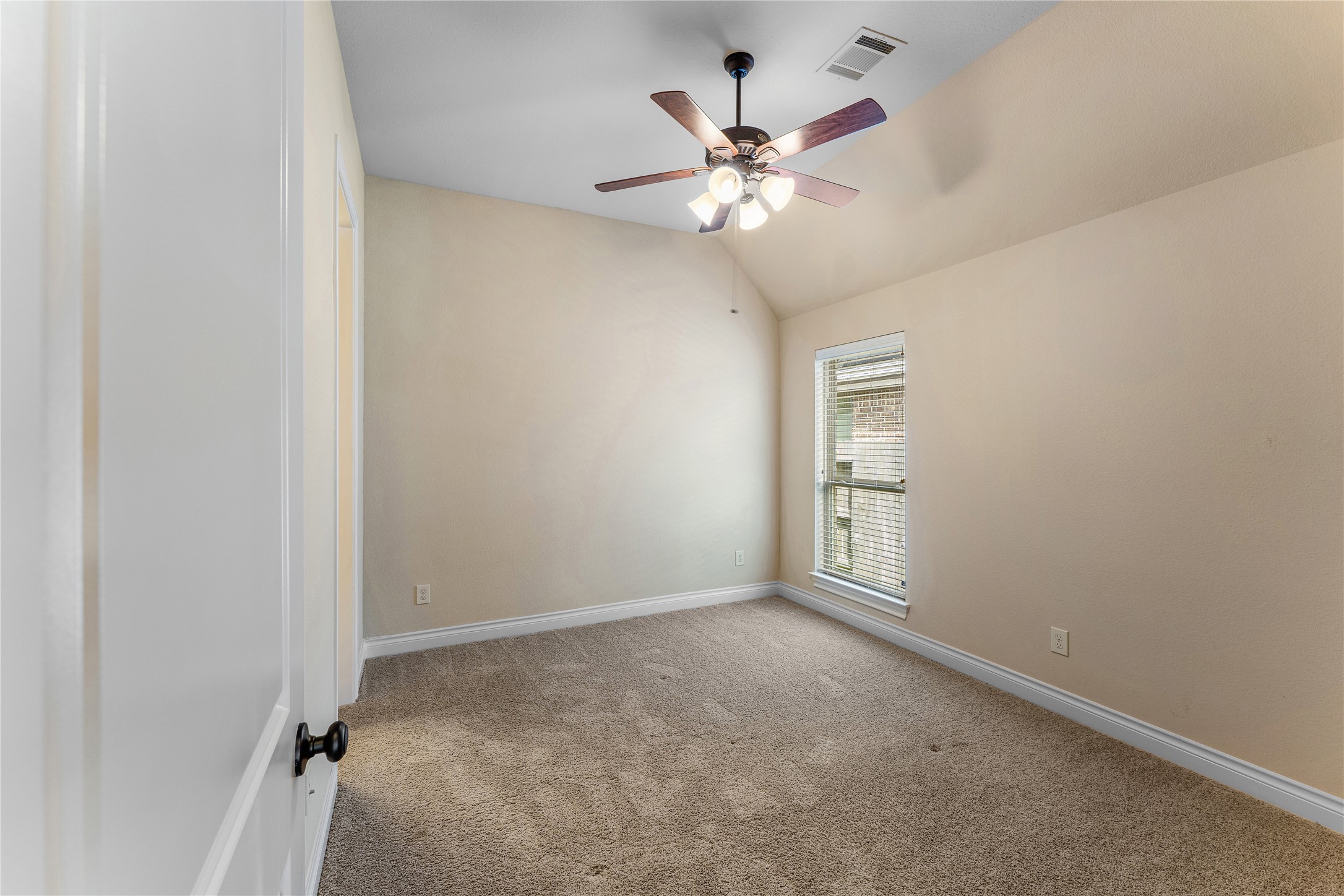 2938 Bobby Jones Road Katy, TX 77494 - Photo 22 of 28 an empty room with chandelier fan