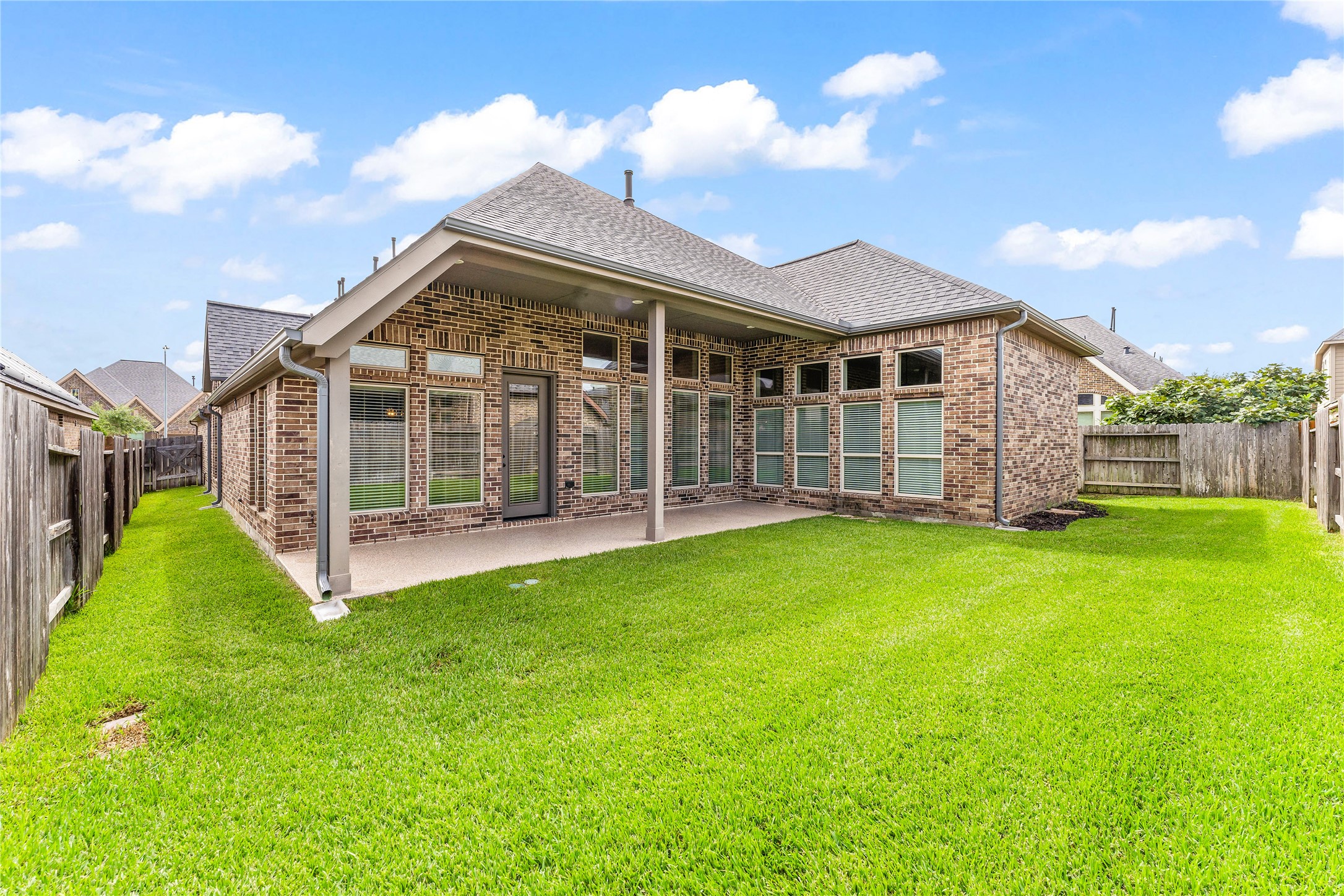 2938 Bobby Jones Road Katy, TX 77494 - Photo 24 of 28 a view of a house with backyard and porch
