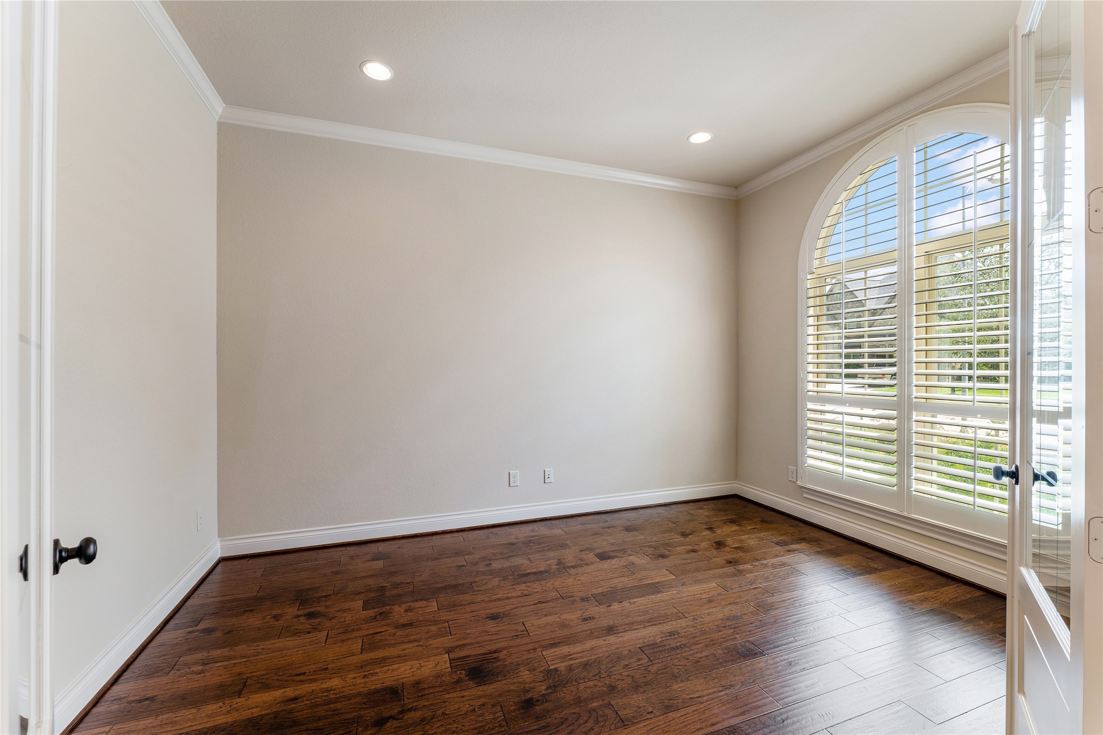 2938 Bobby Jones Road Katy, TX 77494 - Photo 3 of 28 a view of empty room with wooden floor and fan
