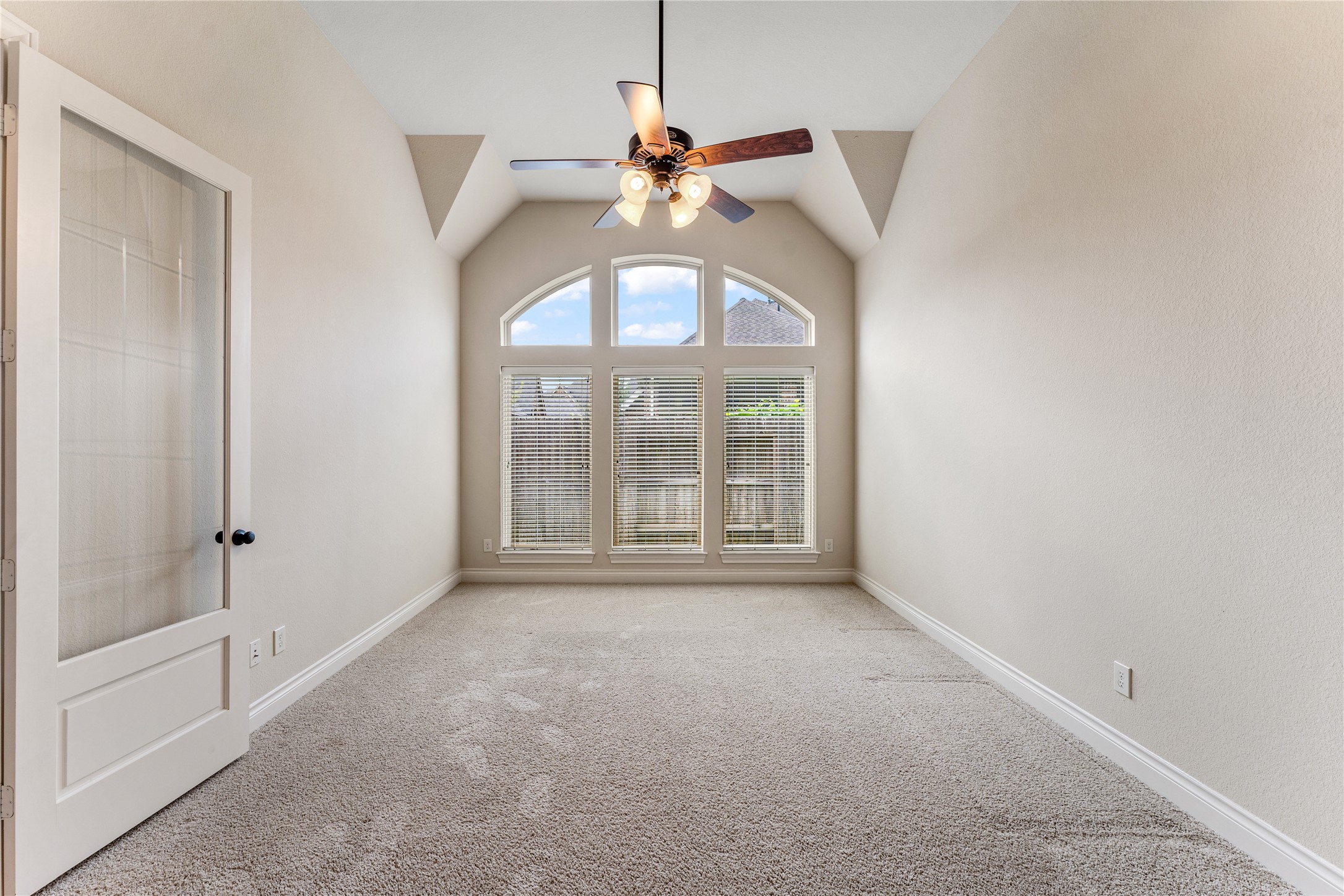 2938 Bobby Jones Road Katy, TX 77494 - Photo 7 of 28 a view of a livingroom with a ceiling fan and window