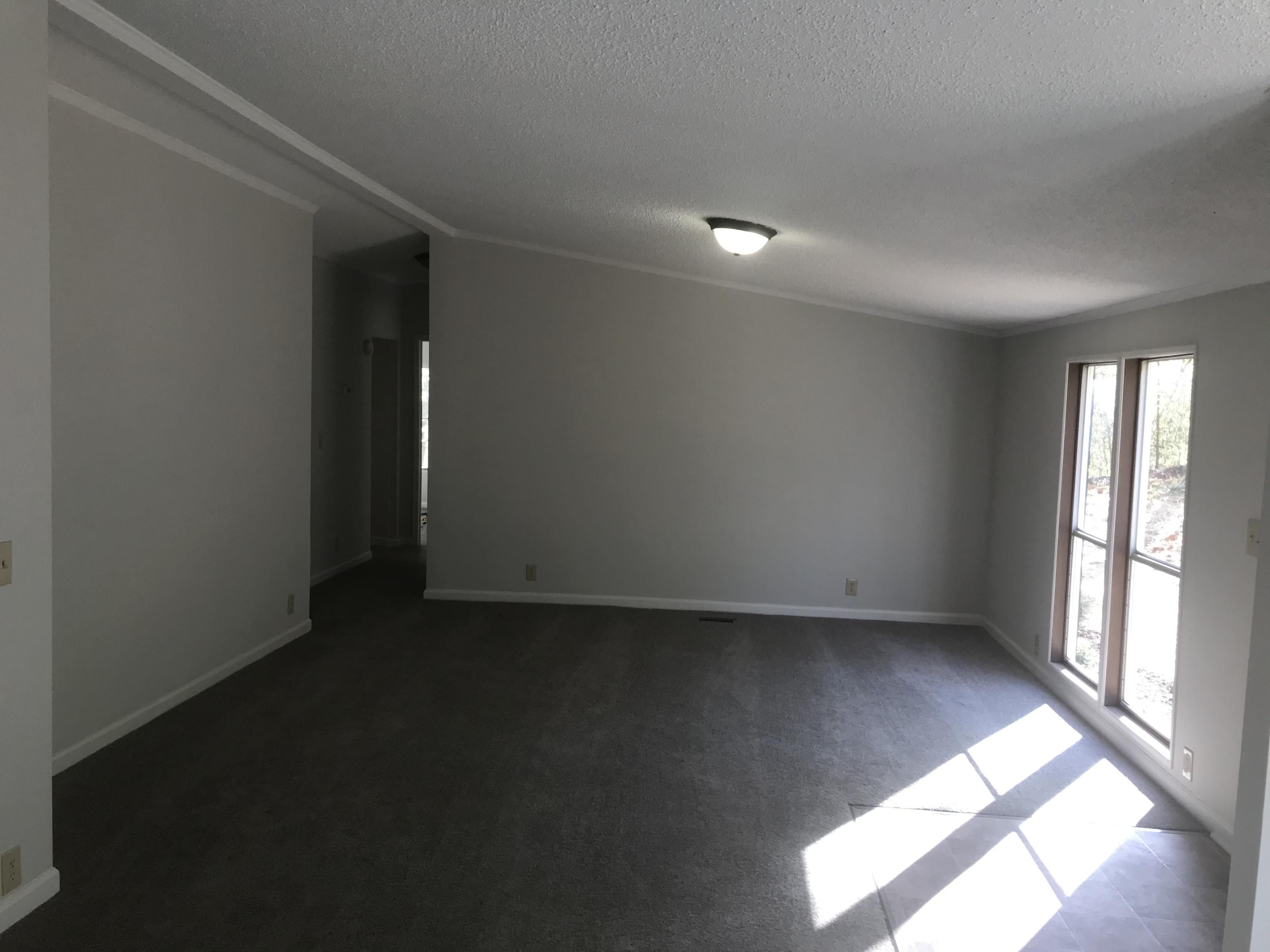 100 Lookout Ridge Road Blue Ridge, VA 24064 - Photo 4 of 11 an empty room with windows