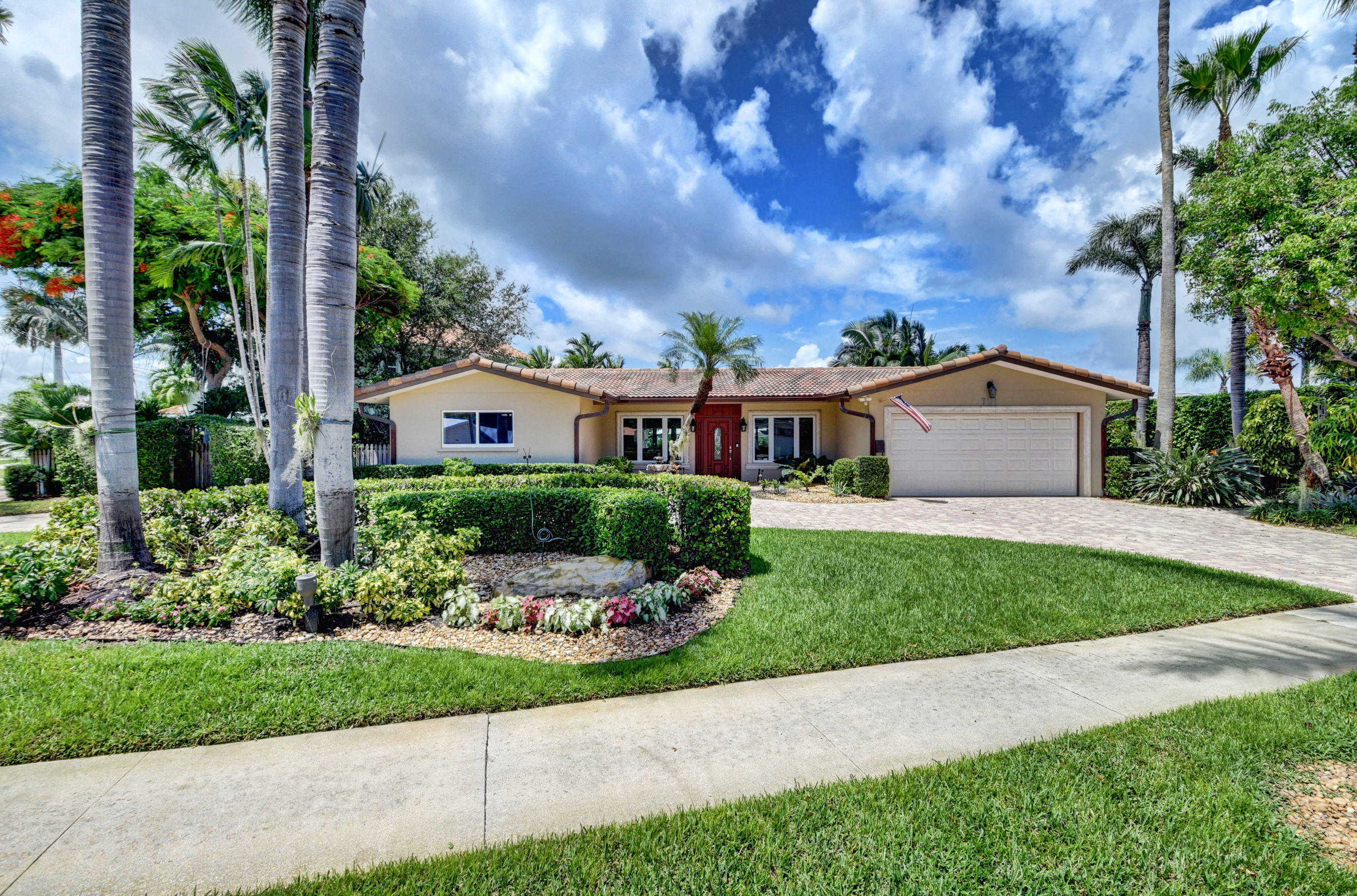 701 Northeast 69th Street Boca Raton, FL 33487 - Photo 1 of 40 Front