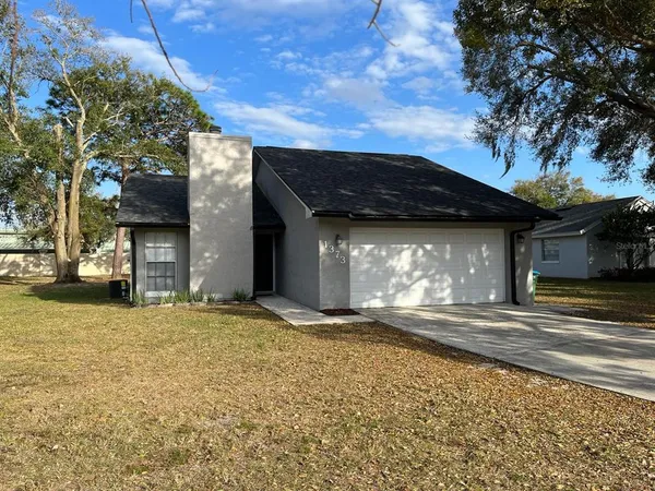 a view of a house with a patio