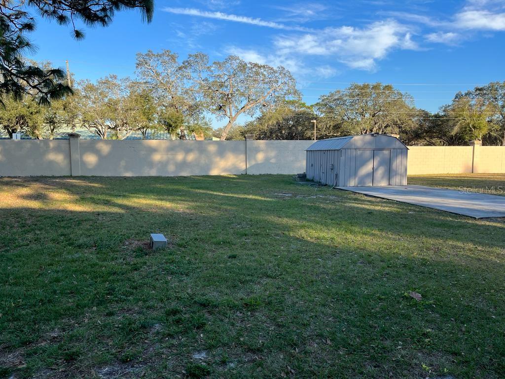 1373 Via Villanova Way Winter Springs, FL 32708 - Photo 12 of 12 a view of a big yard with a house