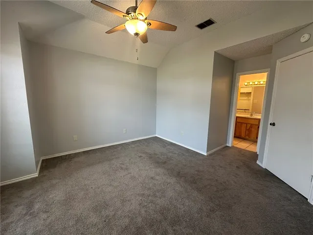 an empty room that has a window