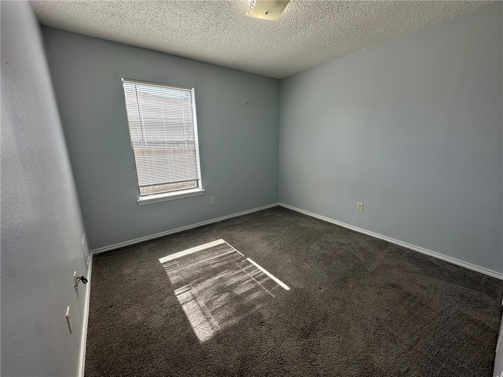 2189 Spring Park Drive Ingleside, TX 78362 - Photo 21 of 35 an empty room with windows
