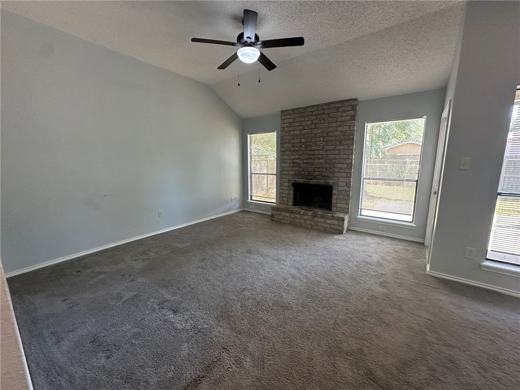 2189 Spring Park Drive Ingleside, TX 78362 - Photo 3 of 35 an empty room with windows and fireplace
