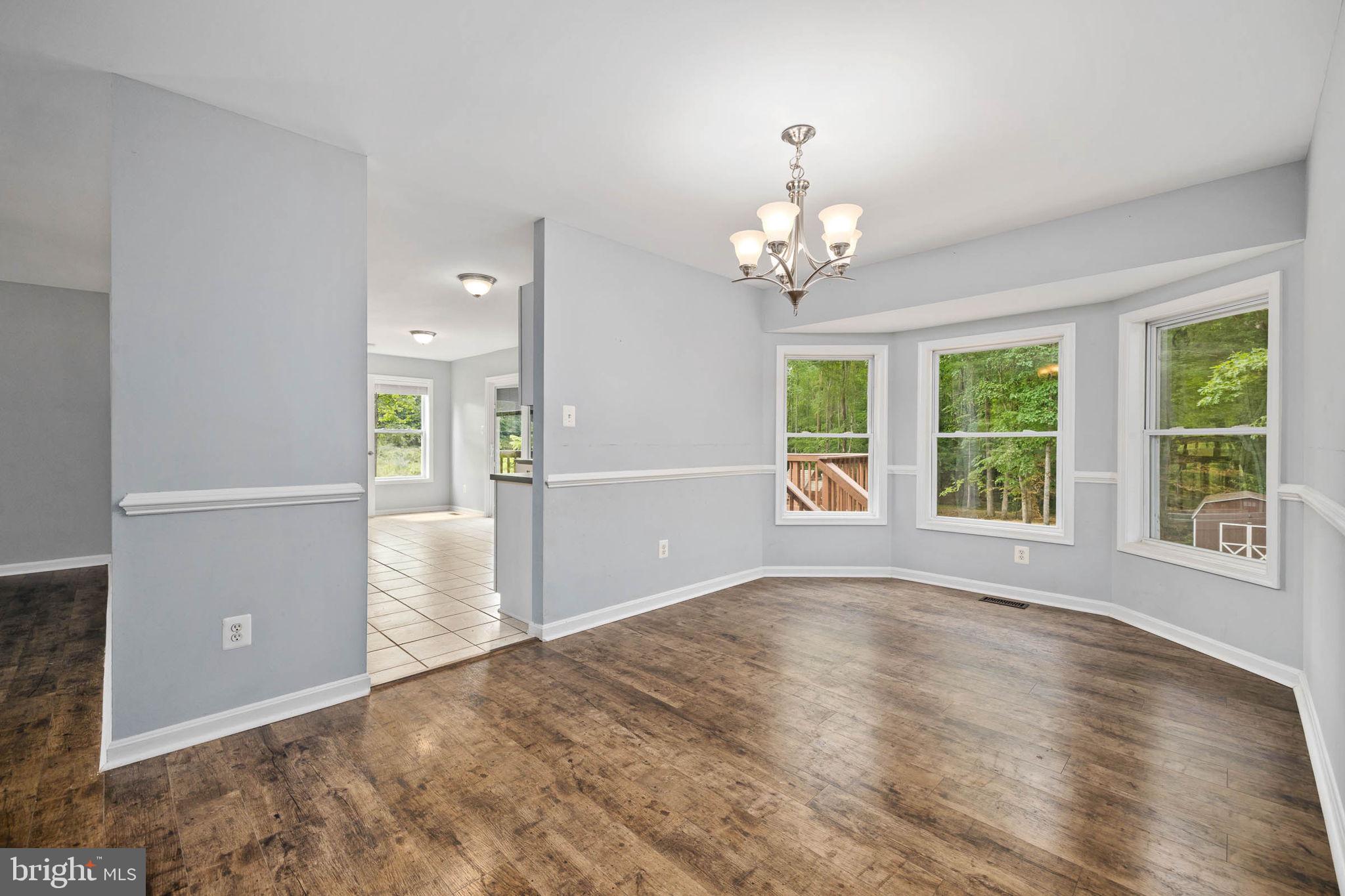 2283 Cromwell Road Catlett, VA 20119 - Photo 28 of 62 Dining room with bump out and chair railing.