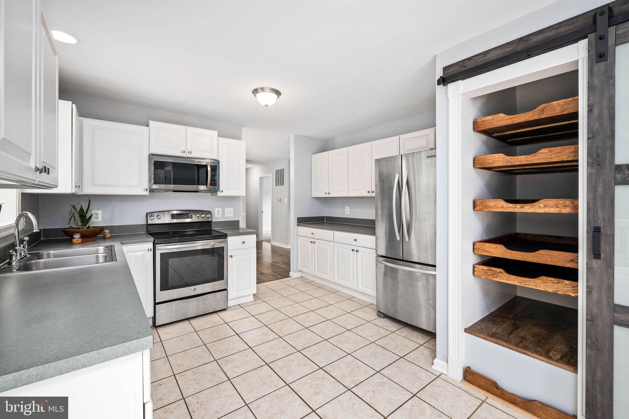 2283 Cromwell Road Catlett, VA 20119 - Photo 32 of 62 Upgraded pantry with born door