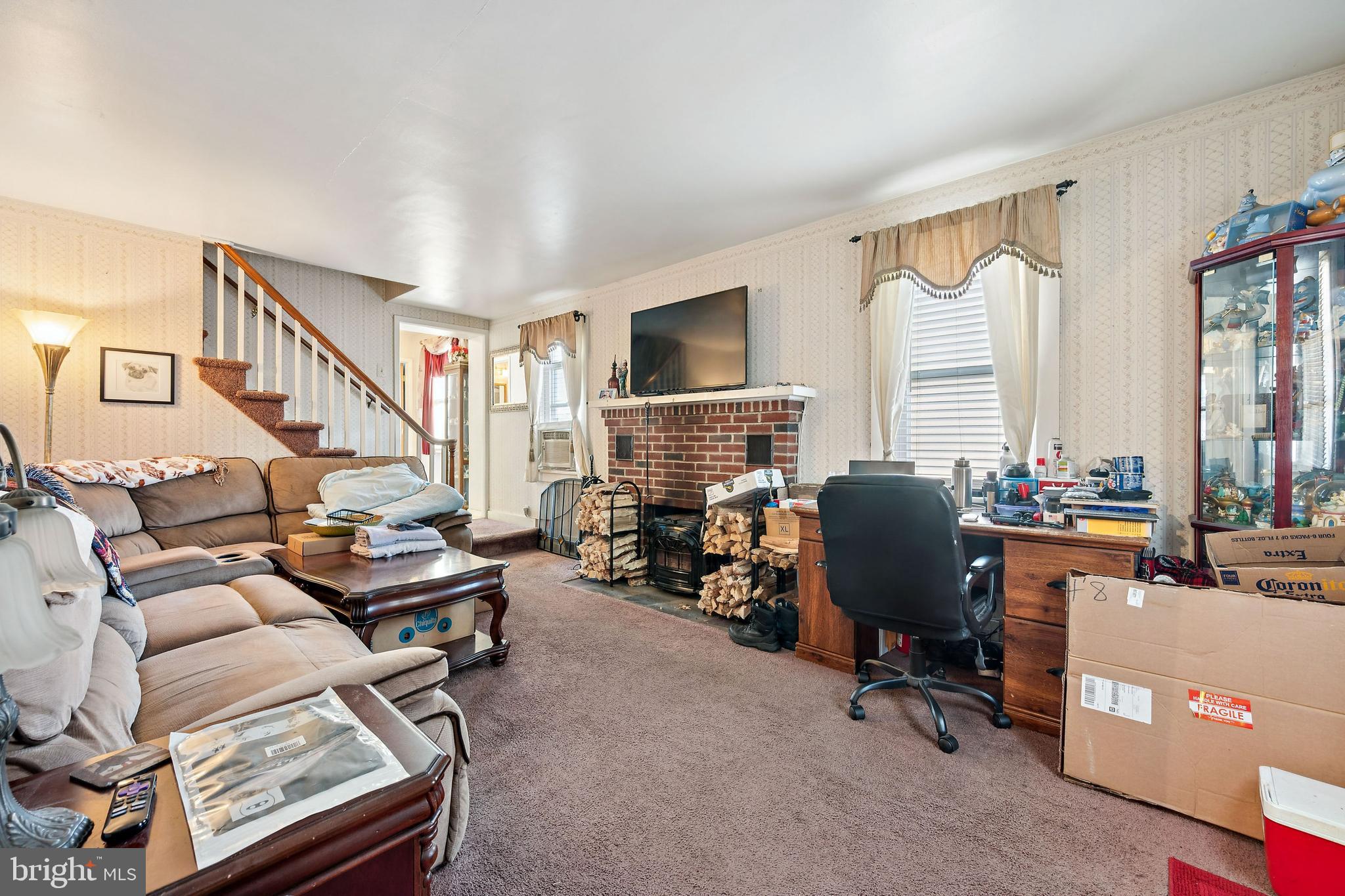315 Rancocas Avenue Riverside, NJ 08075 - Photo 3 of 24 a view of a livingroom with workspace and a window