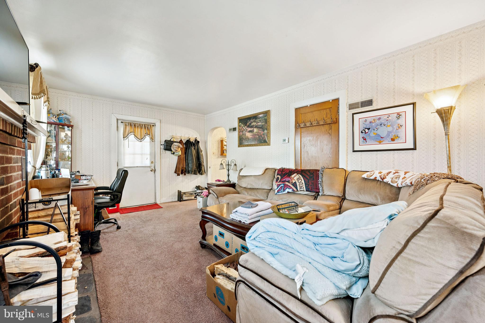 315 Rancocas Avenue Riverside, NJ 08075 - Photo 6 of 24 a living room with furniture a flat screen tv and a table
