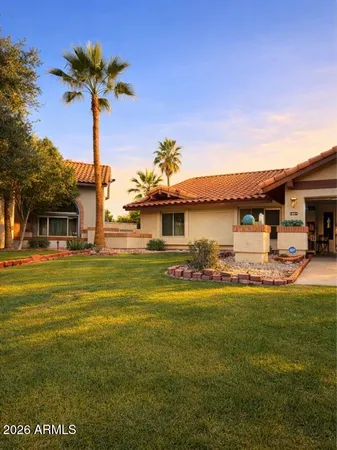 a living room with a flat screen tv and a window