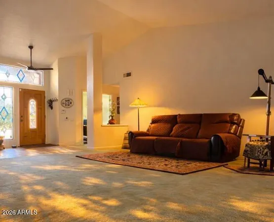 a bathroom with a double vanity sink toilet and a mirror