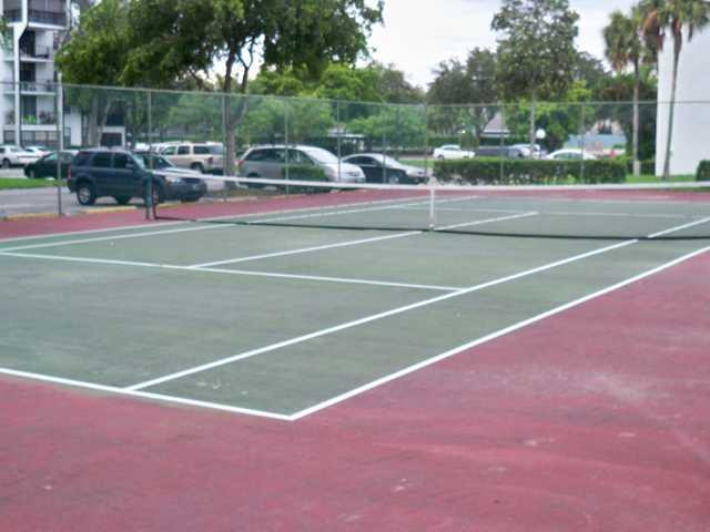 6195 Rock Island Road, Unit 115 Tamarac, FL 33319 - Photo 1 of 12 Tennis Court