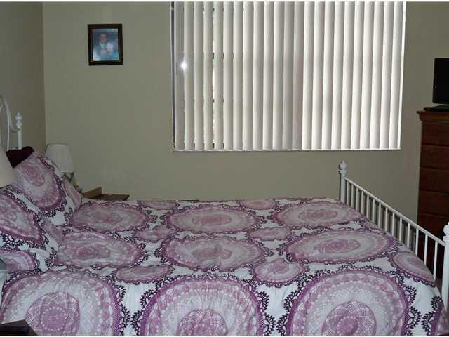 6195 Rock Island Road, Unit 115 Tamarac, FL 33319 - Photo 10 of 12 Master Bedroom