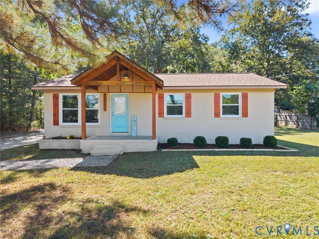 408 Howerton Road Tappahannock, VA 22560 - Photo 1 of 49 Light-toned exterior with a covered entry, wood-to