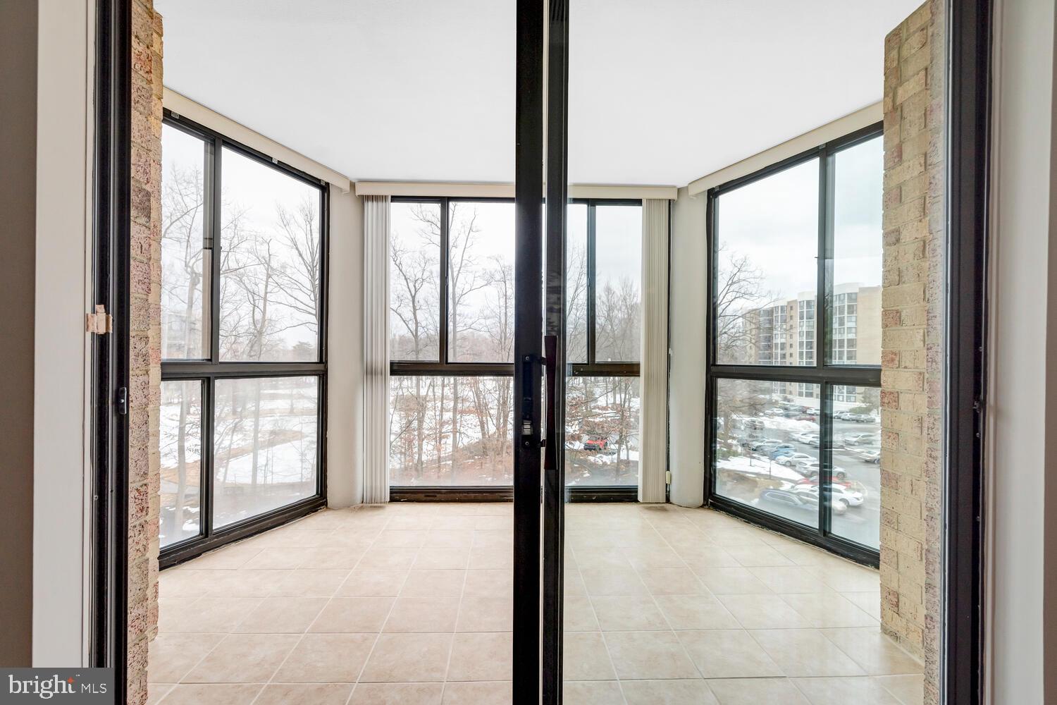 15115 Interlachen Drive, Unit 3425 Silver Spring, MD 20906 - Photo 28 of 41 Sunroom