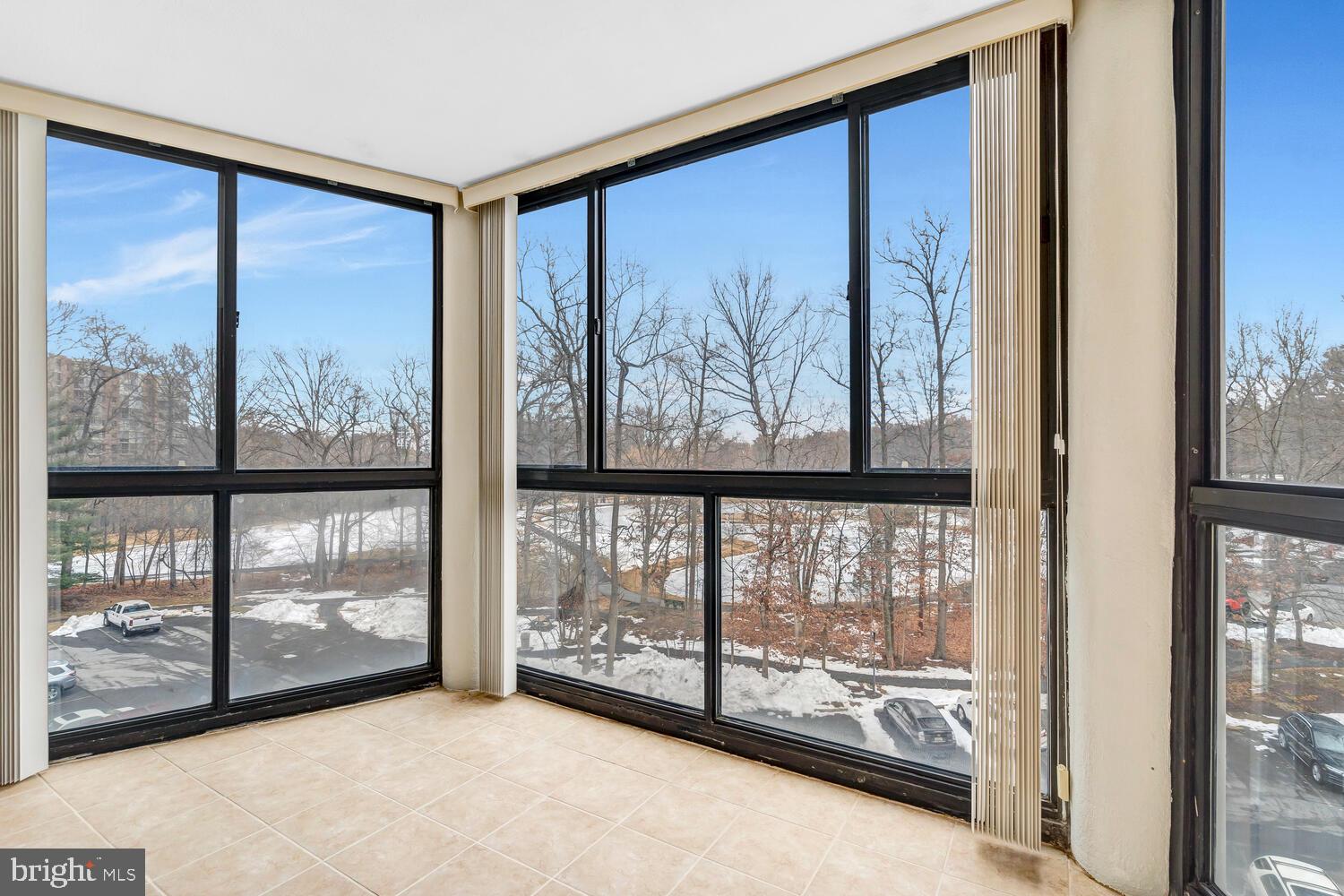 15115 Interlachen Drive, Unit 3425 Silver Spring, MD 20906 - Photo 29 of 41 Sunroom