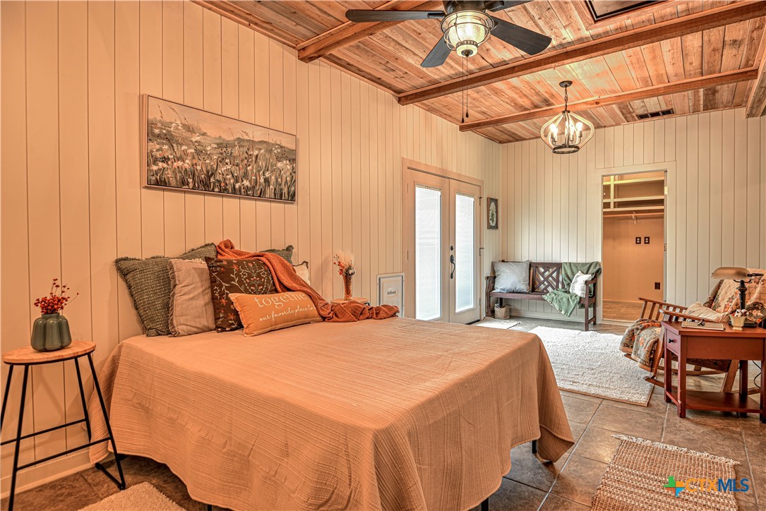 2810 FM 438 Loop Temple, TX 76501 - Photo 18 of 47 a bedroom with bed and wooden floor