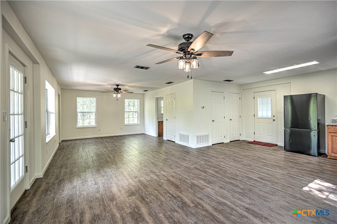 2810 FM 438 Loop Temple, TX 76501 - Photo 40 of 47 a view of an empty room with window and wooden floor