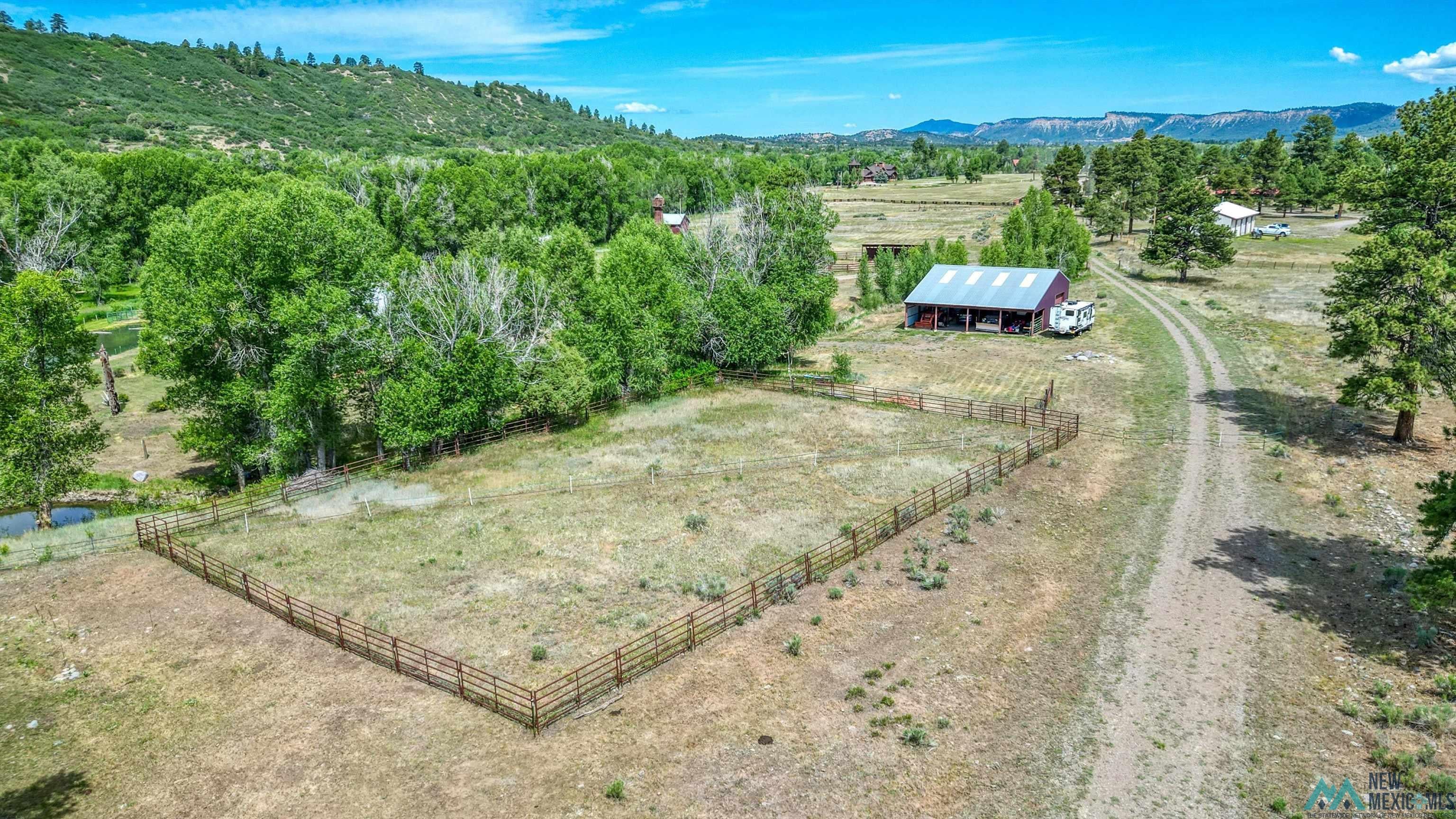 31 Cr 343 Road Chama, NM 87520 - Photo 5 of 44 Aerial view of sparsely populated area featuring a pastoral area and mountains