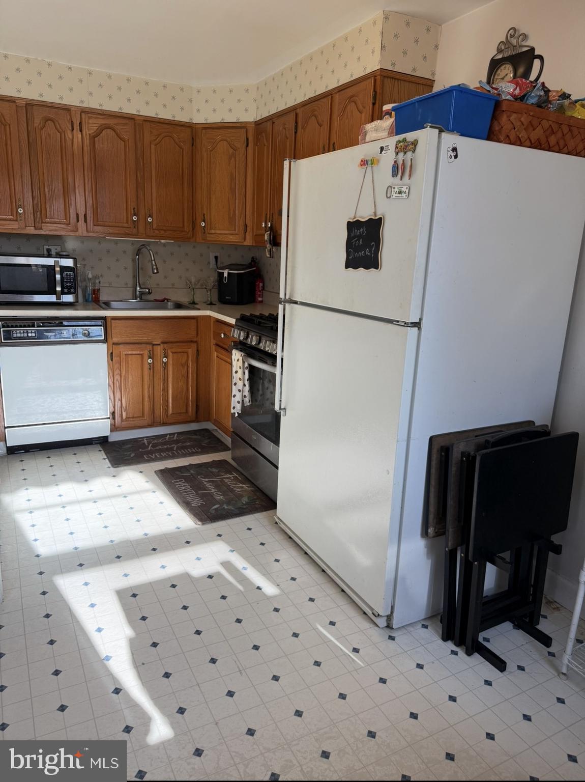 422 Rively Avenue Darby, PA 19023 - Photo 11 of 20 a kitchen with stainless steel appliances a refrigerator sink and cabinets
