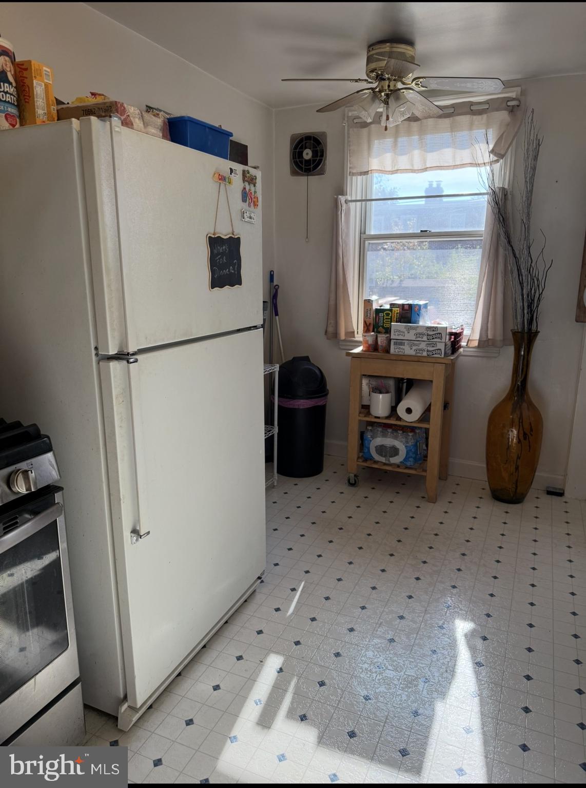 422 Rively Avenue Darby, PA 19023 - Photo 12 of 20 a white refrigerator freezer sitting in a kitchen