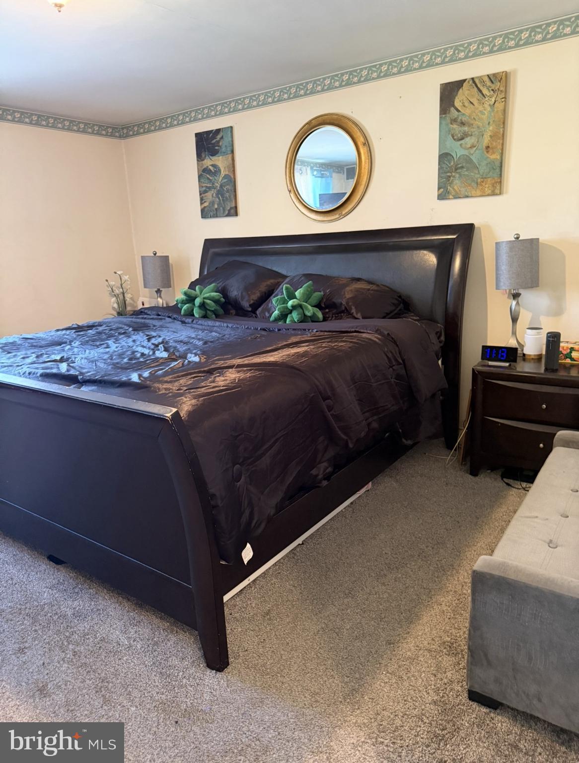 422 Rively Avenue Darby, PA 19023 - Photo 13 of 20 a bedroom with a bed and painting on the wall