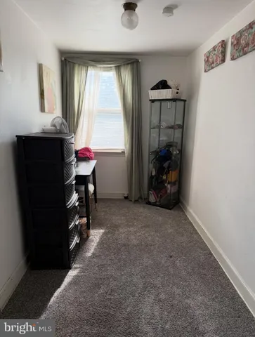 a room with furniture and window