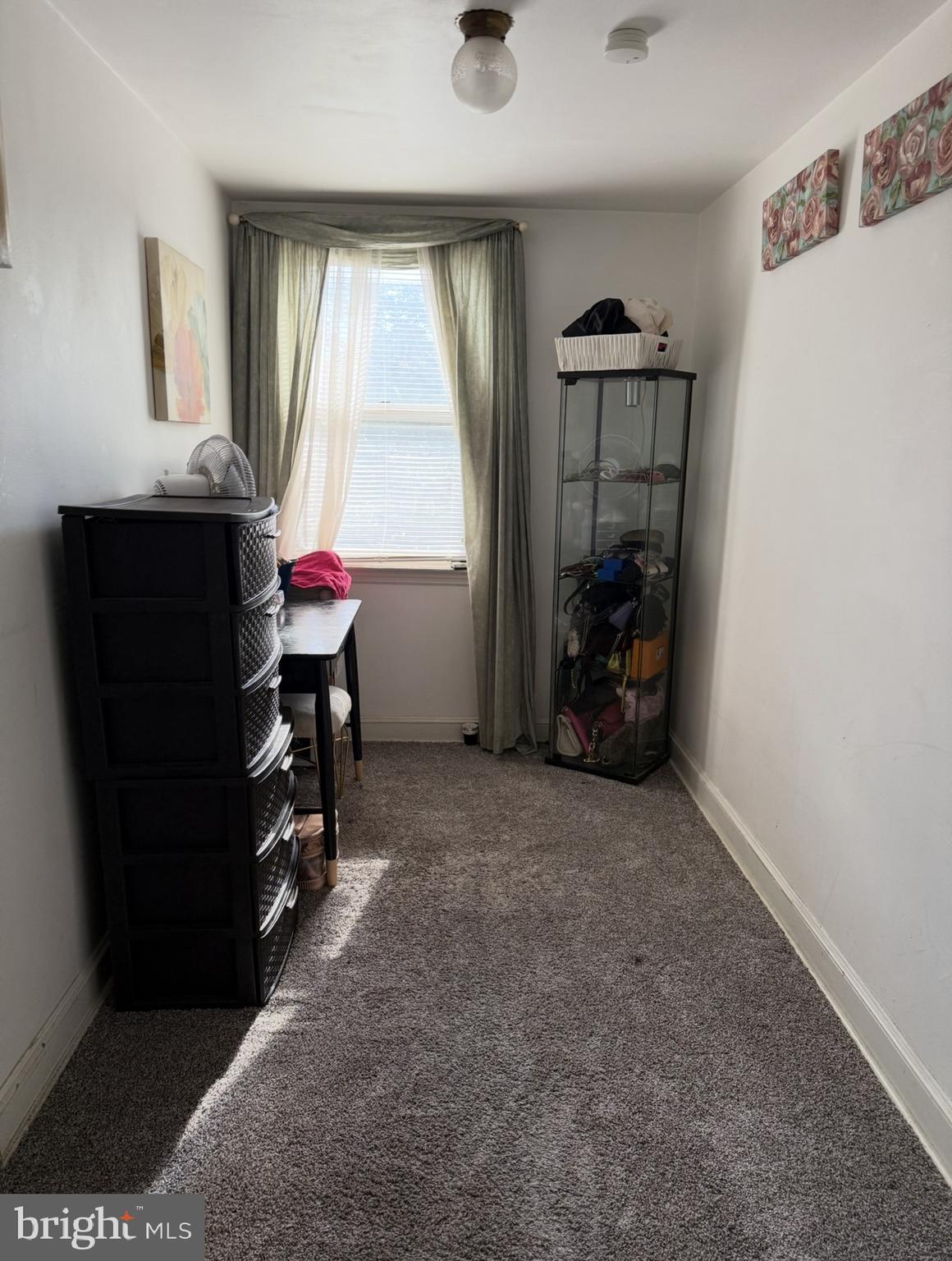 422 Rively Avenue Darby, PA 19023 - Photo 16 of 20 a room with furniture and window