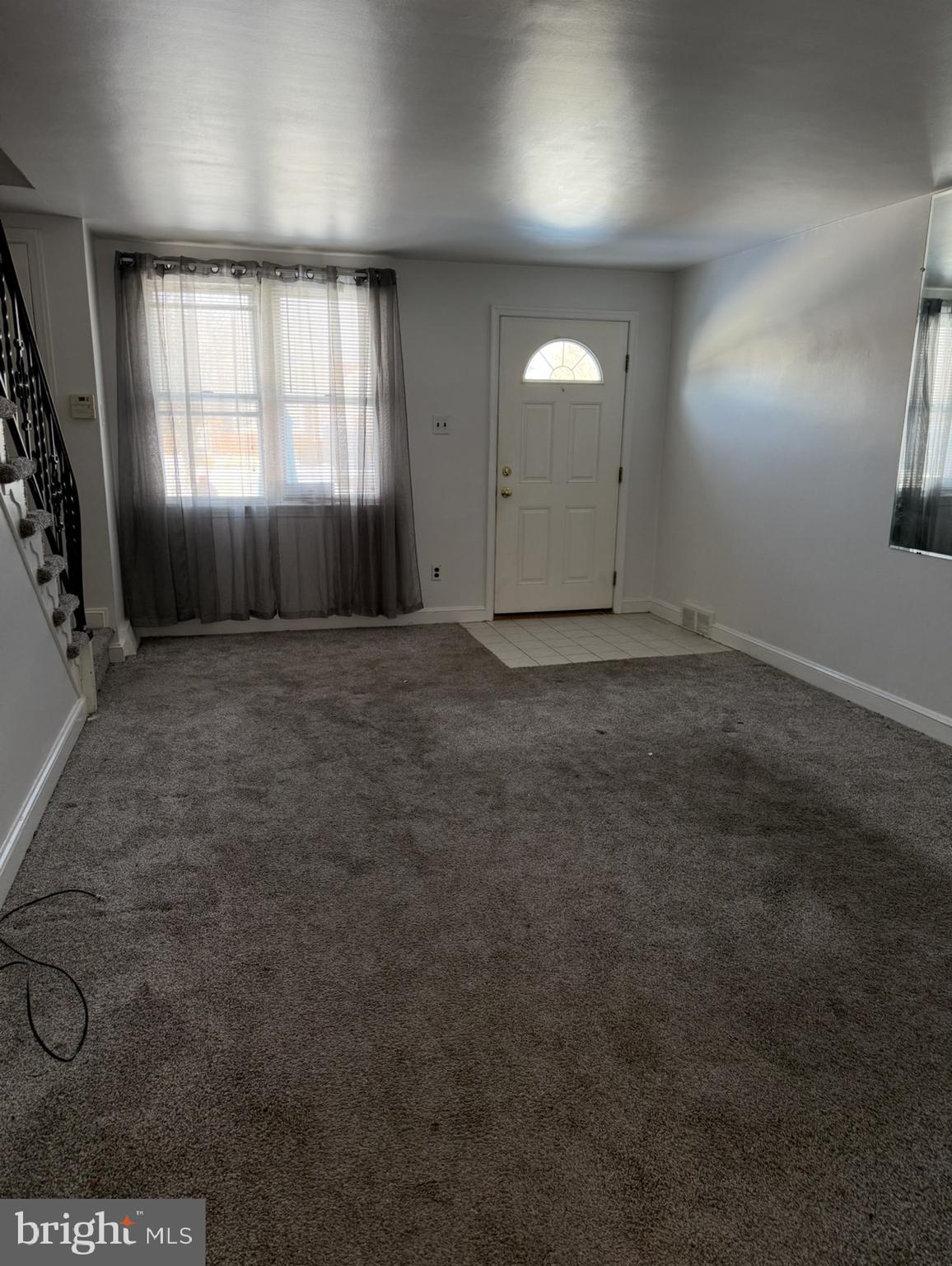422 Rively Avenue Darby, PA 19023 - Photo 6 of 20 an empty room with windows and closet