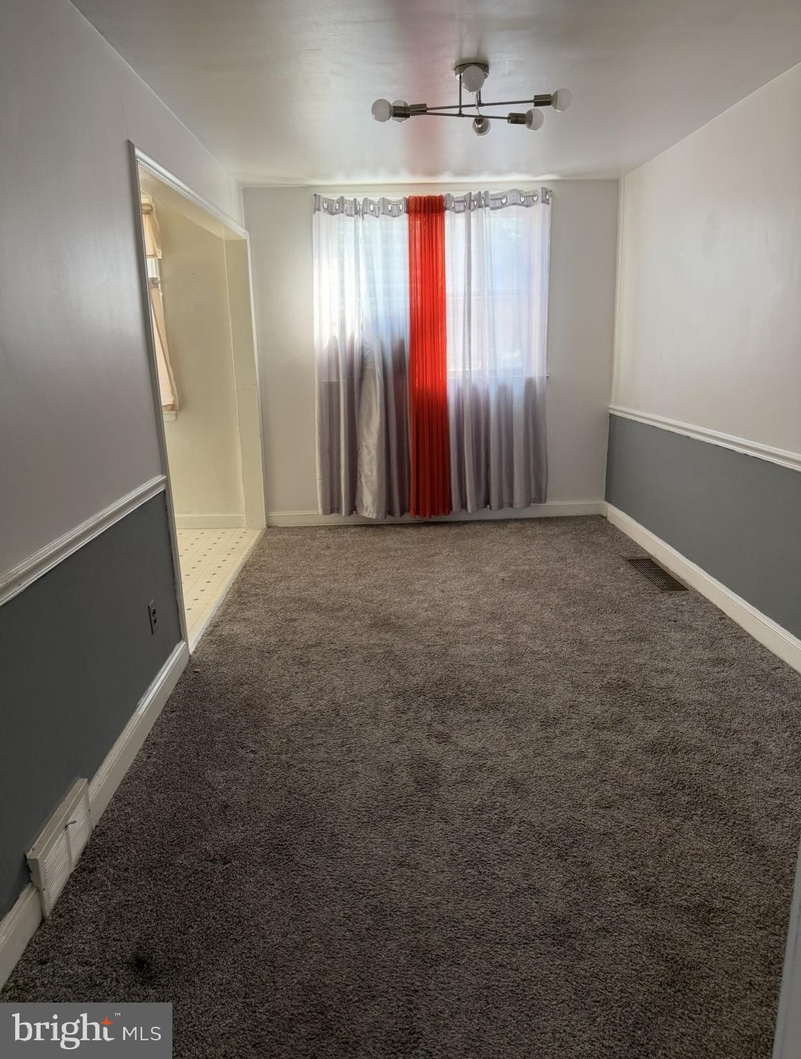 422 Rively Avenue Darby, PA 19023 - Photo 9 of 20 an empty room with windows and fan