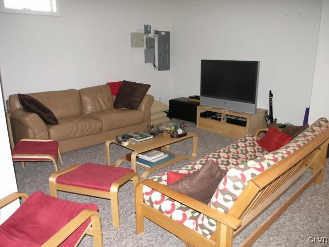 2128 Terry Road Nazareth, PA 18064 - Photo 14 of 15 a living room with furniture and a flat screen tv