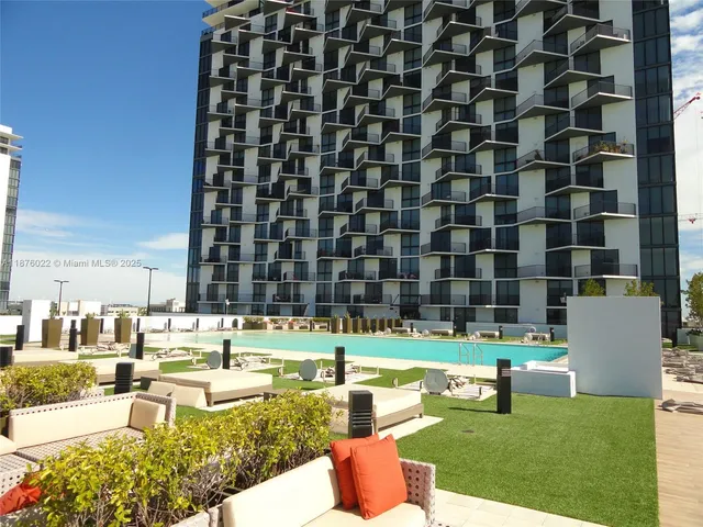 a view of a swimming pool with a patio