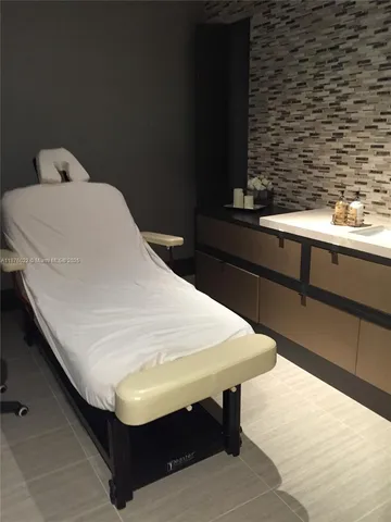 a room with table and chairs