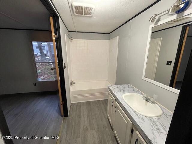 69 Robin Lane Gouldsboro, PA 18424 - Photo 13 of 22 a bathroom with a granite countertop sink a mirror and a bathtub