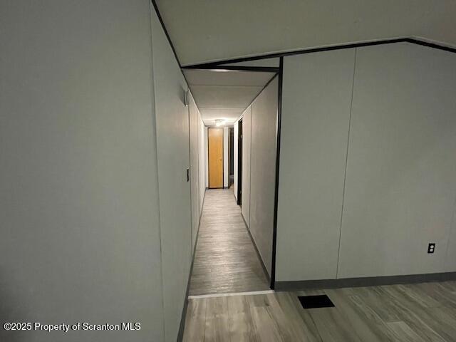 69 Robin Lane Gouldsboro, PA 18424 - Photo 16 of 22 a view of a hallway with wooden floor